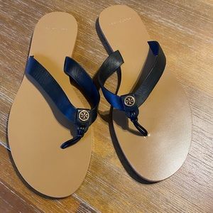 Never worn before Tory Burch leather black flip flops